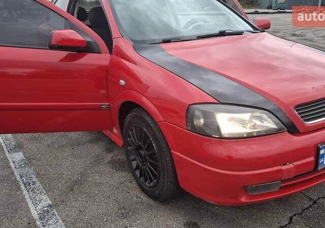Красный Опель Астра, объемом двигателя 1.6 л и пробегом 220 тыс. км за 3300 $, фото 6 на Automoto.ua
