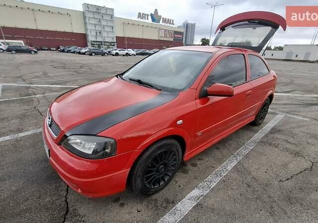 Красный Опель Астра, объемом двигателя 1.6 л и пробегом 220 тыс. км за 3300 $, фото 8 на Automoto.ua