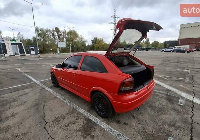 Красный Опель Астра, объемом двигателя 1.6 л и пробегом 220 тыс. км за 3300 $, фото 18 на Automoto.ua