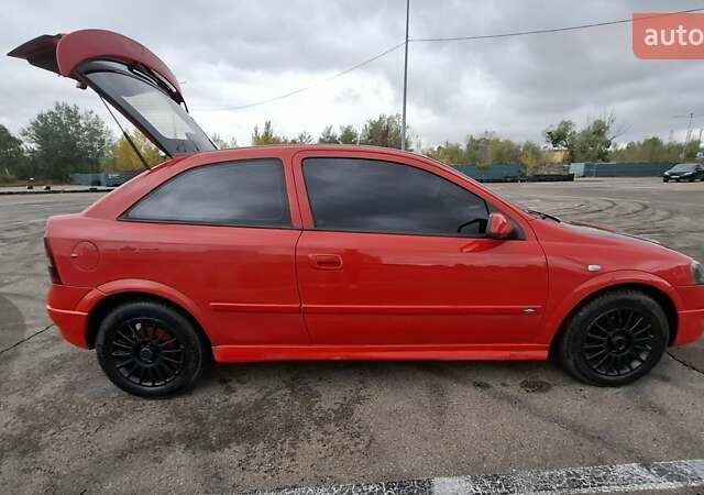 Красный Опель Астра, объемом двигателя 1.6 л и пробегом 220 тыс. км за 3300 $, фото 4 на Automoto.ua