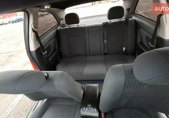Красный Опель Астра, объемом двигателя 1.6 л и пробегом 220 тыс. км за 3300 $, фото 17 на Automoto.ua