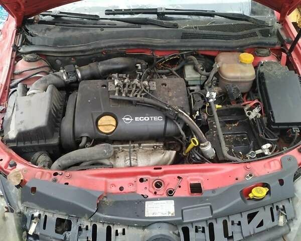 Червоний Опель Астра, об'ємом двигуна 1.8 л та пробігом 276 тис. км за 1290 $, фото 1 на Automoto.ua