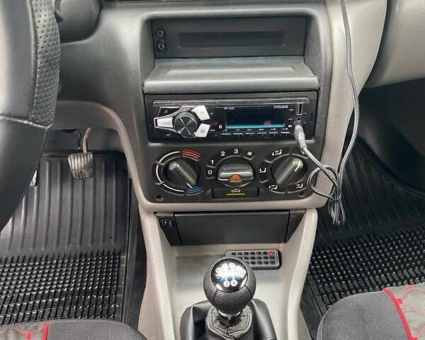 Красный Опель Астра, объемом двигателя 1.4 л и пробегом 369 тыс. км за 1250 $, фото 5 на Automoto.ua
