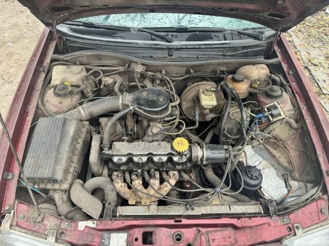 Красный Опель Астра, объемом двигателя 1.6 л и пробегом 492 тыс. км за 600 $, фото 7 на Automoto.ua