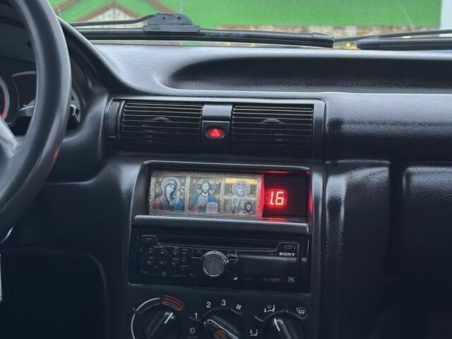 Красный Опель Астра, объемом двигателя 1.6 л и пробегом 400 тыс. км за 1299 $, фото 14 на Automoto.ua