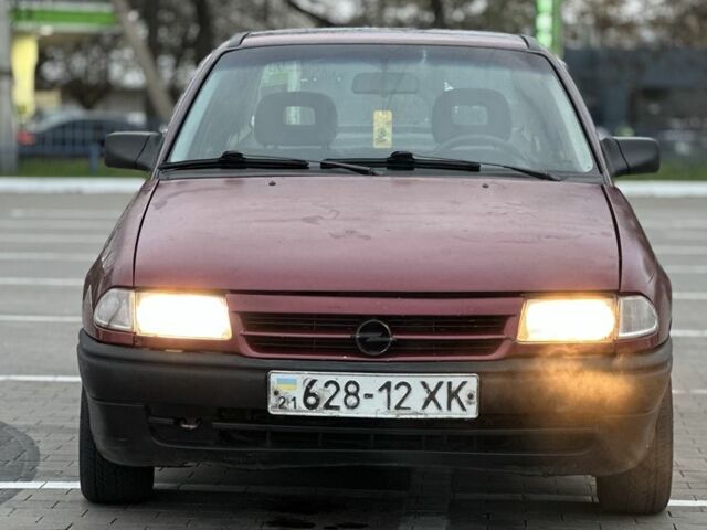 Красный Опель Астра, объемом двигателя 1.6 л и пробегом 400 тыс. км за 1299 $, фото 5 на Automoto.ua