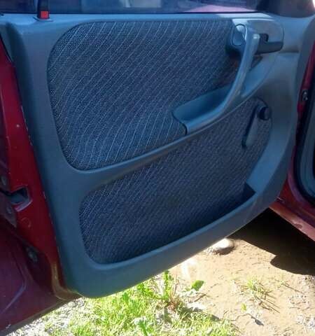 Красный Опель Астра, объемом двигателя 1.6 л и пробегом 250 тыс. км за 1100 $, фото 5 на Automoto.ua