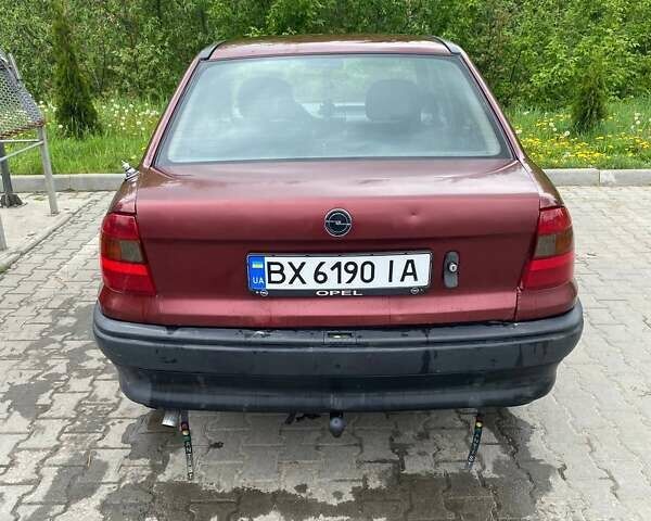 Красный Опель Астра, объемом двигателя 1.4 л и пробегом 369 тыс. км за 1250 $, фото 3 на Automoto.ua