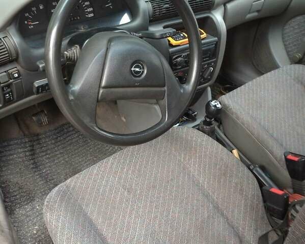 Червоний Опель Астра, об'ємом двигуна 1.4 л та пробігом 220 тис. км за 1800 $, фото 3 на Automoto.ua