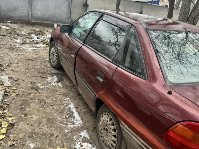 Красный Опель Астра, объемом двигателя 1.6 л и пробегом 492 тыс. км за 600 $, фото 5 на Automoto.ua