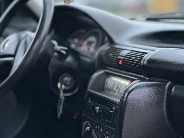 Красный Опель Астра, объемом двигателя 1.6 л и пробегом 400 тыс. км за 1299 $, фото 9 на Automoto.ua