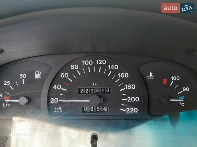 Красный Опель Астра, объемом двигателя 1.6 л и пробегом 223 тыс. км за 3300 $, фото 11 на Automoto.ua