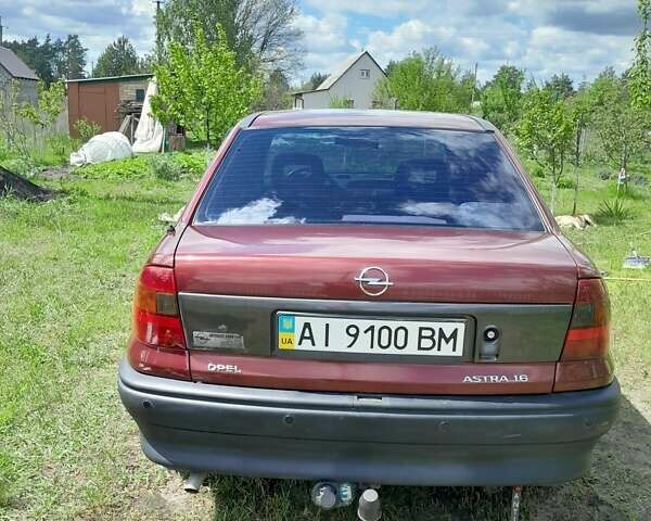 Красный Опель Астра, объемом двигателя 1.6 л и пробегом 223 тыс. км за 3300 $, фото 4 на Automoto.ua