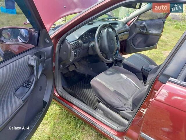 Красный Опель Астра, объемом двигателя 1.6 л и пробегом 223 тыс. км за 3300 $, фото 10 на Automoto.ua