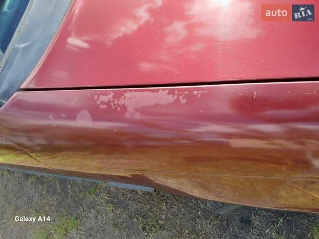 Красный Опель Астра, объемом двигателя 1.6 л и пробегом 223 тыс. км за 3300 $, фото 5 на Automoto.ua