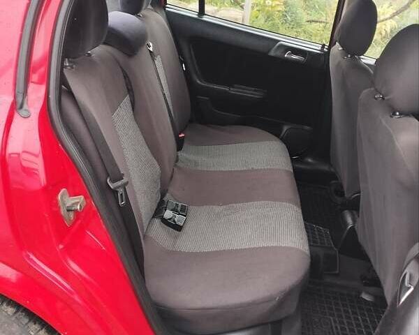 Красный Опель Астра, объемом двигателя 1.8 л и пробегом 250 тыс. км за 3400 $, фото 7 на Automoto.ua