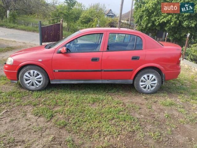 Красный Опель Астра, объемом двигателя 1.8 л и пробегом 250 тыс. км за 3400 $, фото 2 на Automoto.ua
