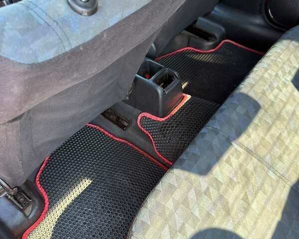 Красный Опель Астра, объемом двигателя 1.4 л и пробегом 283 тыс. км за 3200 $, фото 13 на Automoto.ua