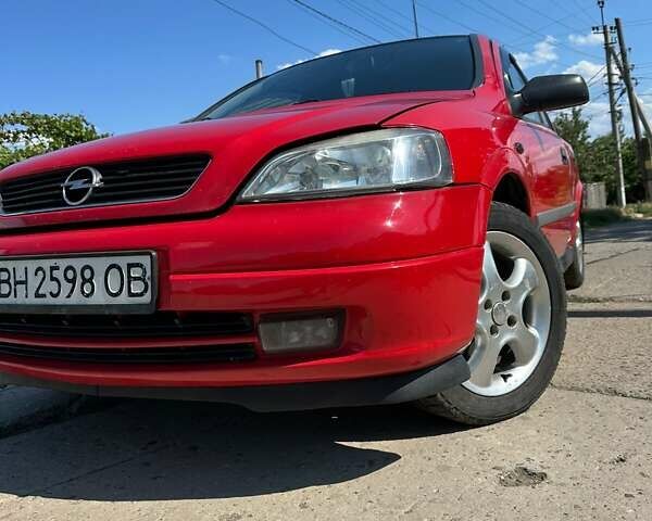Красный Опель Астра, объемом двигателя 1.4 л и пробегом 283 тыс. км за 3200 $, фото 11 на Automoto.ua