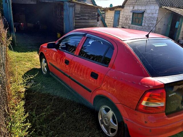 Красный Опель Астра, объемом двигателя 1.8 л и пробегом 170 тыс. км за 2280 $, фото 4 на Automoto.ua
