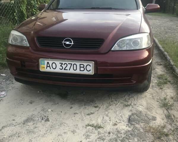 Красный Опель Астра, объемом двигателя 1.39 л и пробегом 290 тыс. км за 2400 $, фото 6 на Automoto.ua