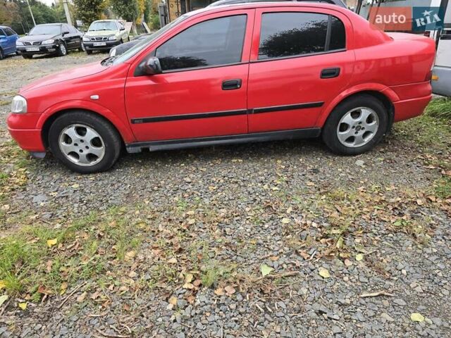 Красный Опель Астра, объемом двигателя 1.6 л и пробегом 345 тыс. км за 2990 $, фото 3 на Automoto.ua