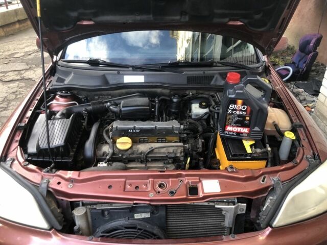 Червоний Опель Астра, об'ємом двигуна 1.6 л та пробігом 177 тис. км за 3800 $, фото 5 на Automoto.ua