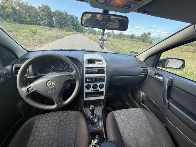 Красный Опель Астра, объемом двигателя 2 л и пробегом 300 тыс. км за 1250 $, фото 6 на Automoto.ua