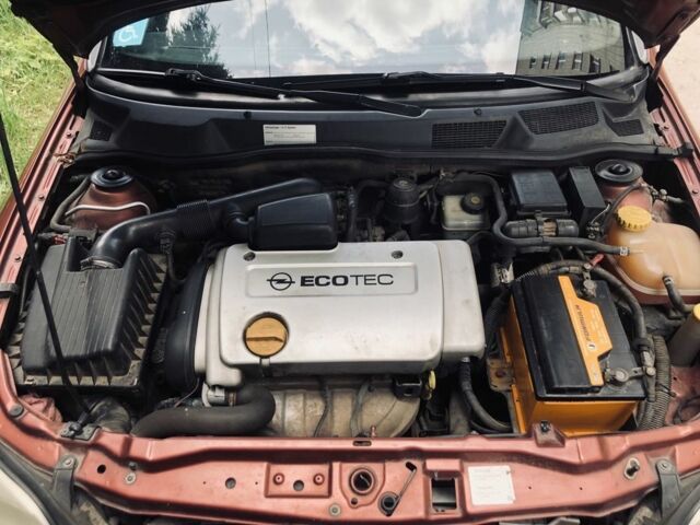 Червоний Опель Астра, об'ємом двигуна 1.6 л та пробігом 177 тис. км за 3800 $, фото 4 на Automoto.ua