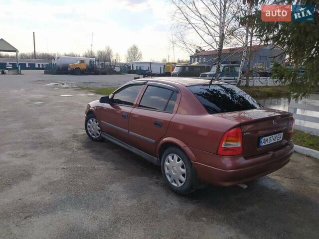 Красный Опель Астра, объемом двигателя 1.4 л и пробегом 210 тыс. км за 3400 $, фото 5 на Automoto.ua