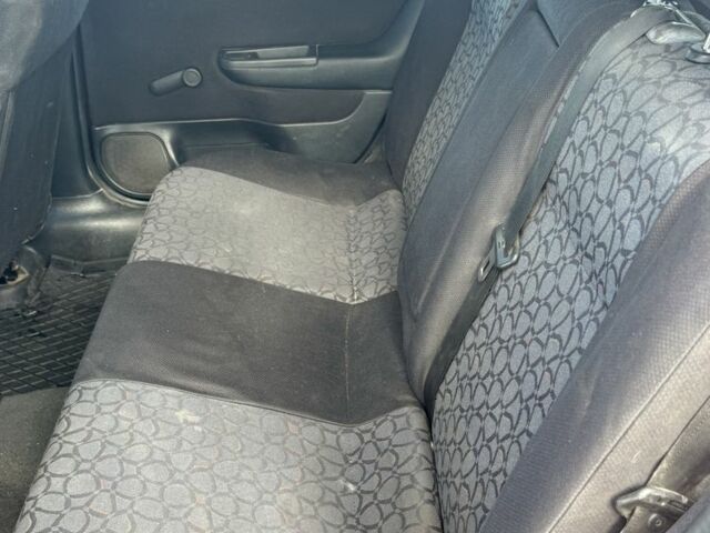 Красный Опель Астра, объемом двигателя 2 л и пробегом 300 тыс. км за 1250 $, фото 5 на Automoto.ua