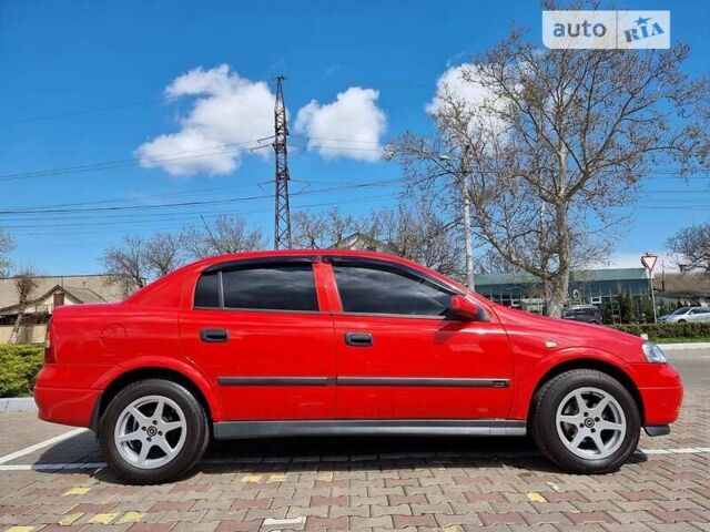 Красный Опель Астра, объемом двигателя 1.6 л и пробегом 224 тыс. км за 4500 $, фото 2 на Automoto.ua