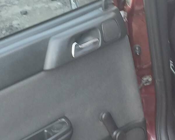 Червоний Опель Астра, об'ємом двигуна 1.4 л та пробігом 247 тис. км за 2300 $, фото 13 на Automoto.ua