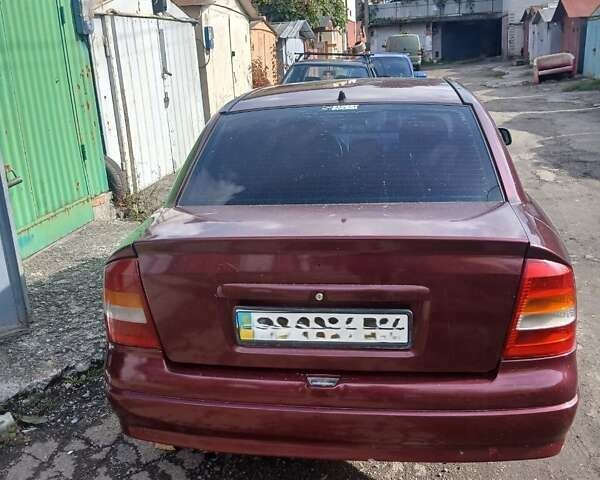 Червоний Опель Астра, об'ємом двигуна 1.4 л та пробігом 247 тис. км за 2300 $, фото 25 на Automoto.ua
