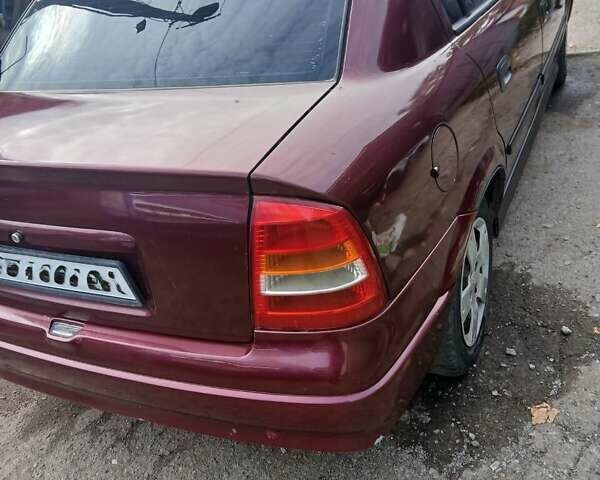 Червоний Опель Астра, об'ємом двигуна 1.4 л та пробігом 247 тис. км за 2300 $, фото 9 на Automoto.ua