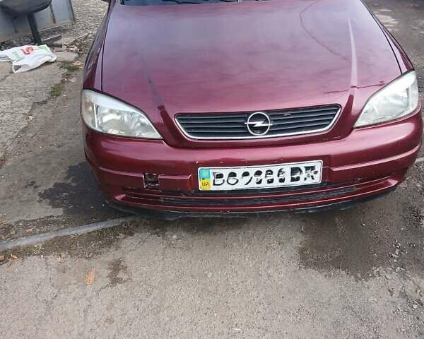 Червоний Опель Астра, об'ємом двигуна 1.4 л та пробігом 247 тис. км за 2300 $, фото 23 на Automoto.ua