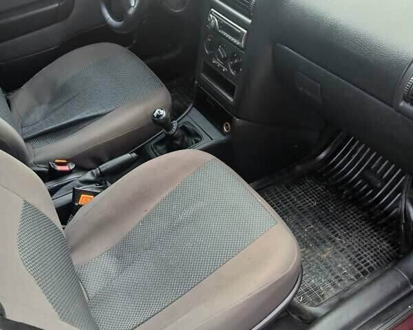 Червоний Опель Астра, об'ємом двигуна 1.4 л та пробігом 247 тис. км за 2300 $, фото 29 на Automoto.ua