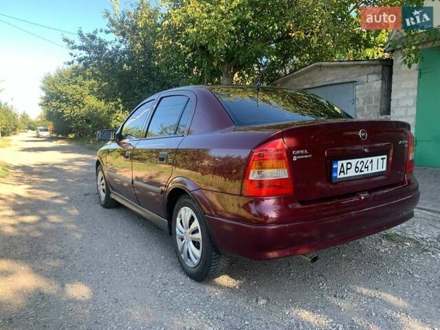 Червоний Опель Астра, об'ємом двигуна 1.6 л та пробігом 285 тис. км за 3200 $, фото 5 на Automoto.ua
