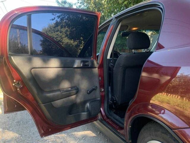 Красный Опель Астра, объемом двигателя 1.6 л и пробегом 285 тыс. км за 3000 $, фото 16 на Automoto.ua