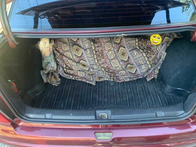 Красный Опель Астра, объемом двигателя 1.6 л и пробегом 285 тыс. км за 3000 $, фото 13 на Automoto.ua