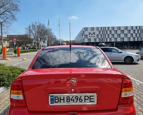 Красный Опель Астра, объемом двигателя 1.6 л и пробегом 224 тыс. км за 4500 $, фото 3 на Automoto.ua