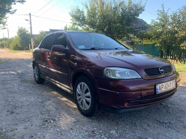 Красный Опель Астра, объемом двигателя 1.6 л и пробегом 285 тыс. км за 3000 $, фото 1 на Automoto.ua