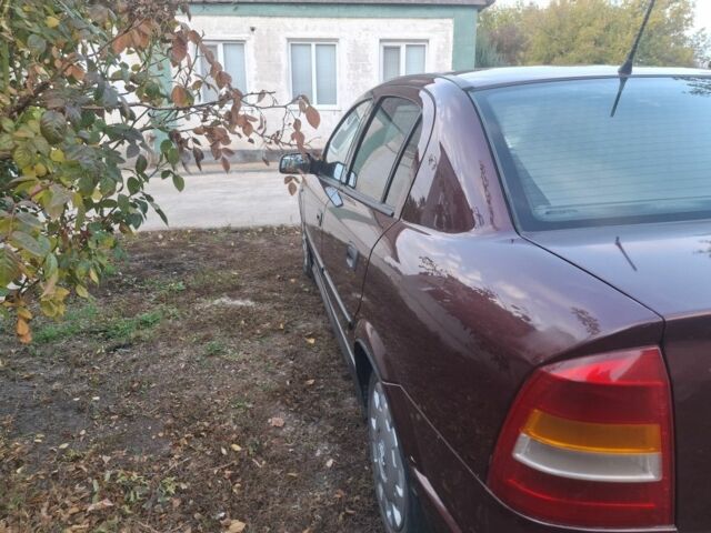 Червоний Опель Астра, об'ємом двигуна 1 л та пробігом 230 тис. км за 4000 $, фото 3 на Automoto.ua