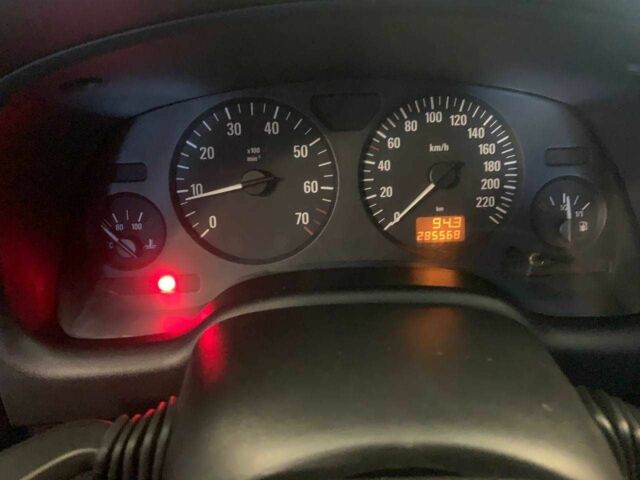 Красный Опель Астра, объемом двигателя 1.6 л и пробегом 285 тыс. км за 3000 $, фото 10 на Automoto.ua