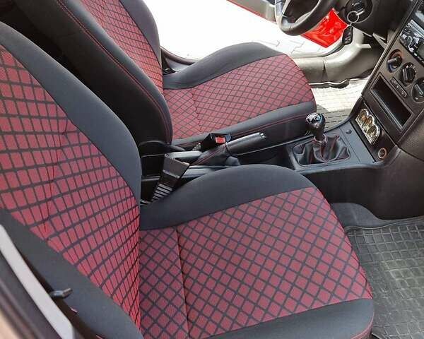 Красный Опель Астра, объемом двигателя 1.6 л и пробегом 224 тыс. км за 4500 $, фото 7 на Automoto.ua