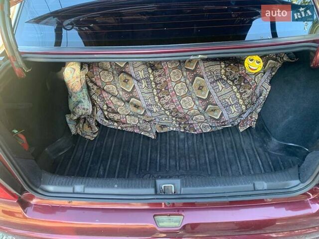 Червоний Опель Астра, об'ємом двигуна 1.6 л та пробігом 285 тис. км за 3200 $, фото 13 на Automoto.ua