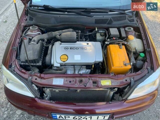 Червоний Опель Астра, об'ємом двигуна 1.6 л та пробігом 285 тис. км за 3200 $, фото 8 на Automoto.ua