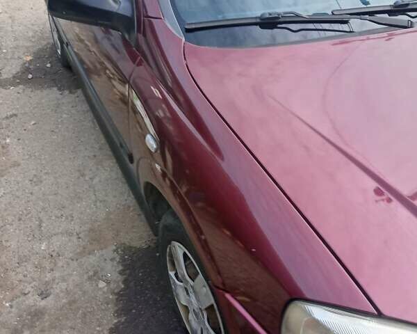 Червоний Опель Астра, об'ємом двигуна 1.4 л та пробігом 247 тис. км за 2300 $, фото 20 на Automoto.ua