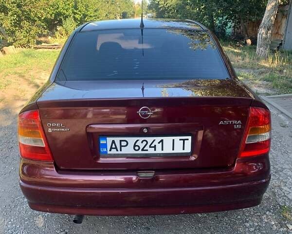 Червоний Опель Астра, об'ємом двигуна 1.6 л та пробігом 285 тис. км за 3200 $, фото 4 на Automoto.ua