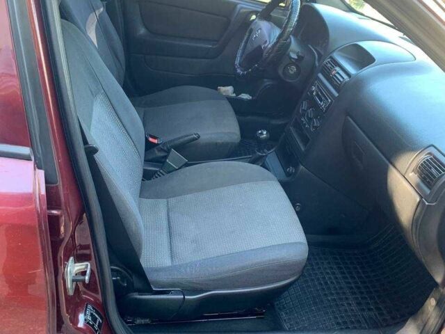 Красный Опель Астра, объемом двигателя 1.6 л и пробегом 285 тыс. км за 3000 $, фото 11 на Automoto.ua